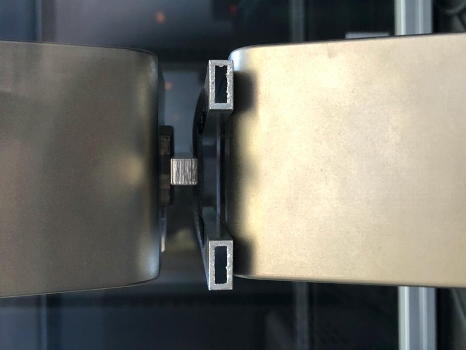 A picture containing indoor, microwave, sitting, stainless

Description automatically generated